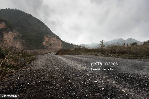 country road in south china. - mud stock pictures, royalty-free photos & images