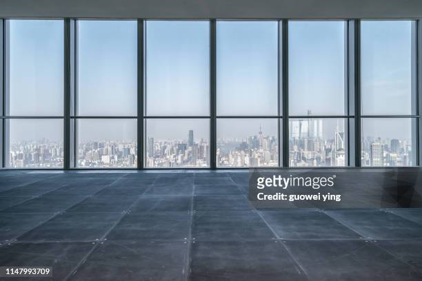 looking at the shanghai skyline through the window - inner views stock-fotos und bilder