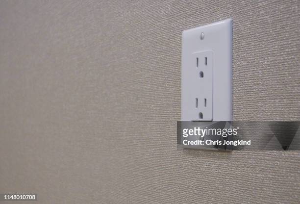 electical outlet on wall - plug socket stock pictures, royalty-free photos & images