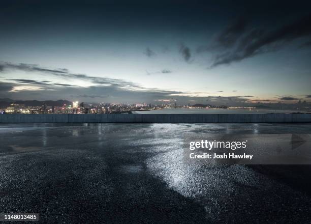 city parking lot and square - empty road mountains stock pictures, royalty-free photos & images