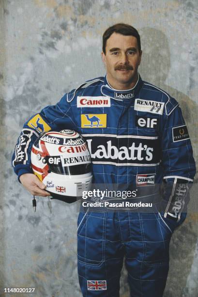 Nigel Mansell of Great Britain, driver of the Canon Williams Team Williams FW14 Renault RS3 V10 poses for a portrait during pre season testing on 1...