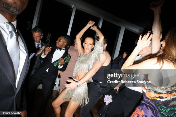 Celine Dion dances with Pepe Munoz at the Met Gala "Boom Boom Afterparty" at Top of the Standard on May 6, 2019 in New York City.