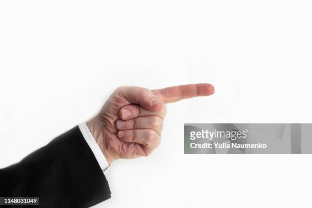 man pointing at something, closeup of hand - pointer stick stock pictures, royalty-free photos & images