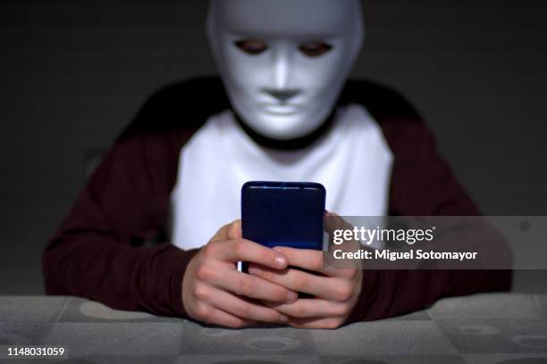 anonymous cyberbullying - cyberbullying stock pictures, royalty-free photos & images