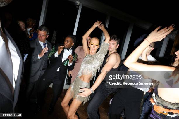Celine Dion dances with Pepe Munoz at the Met Gala "Boom Boom Afterparty" at Top of the Standard on May 6, 2019 in New York City.