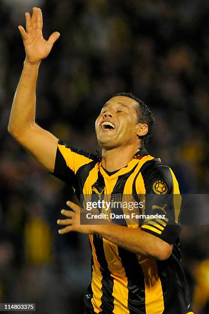 Dario Rodriguez of Penarol celebrates a scored goal against Velez during a match as part of Santander Libertadores Cup 2011 at Centenary Stadium on...