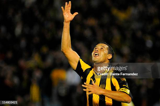 Dario Rodriguez of Penarol celebrates a scored goal against Velez during a match as part of Santander Libertadores Cup 2011 at Centenary Stadium on...