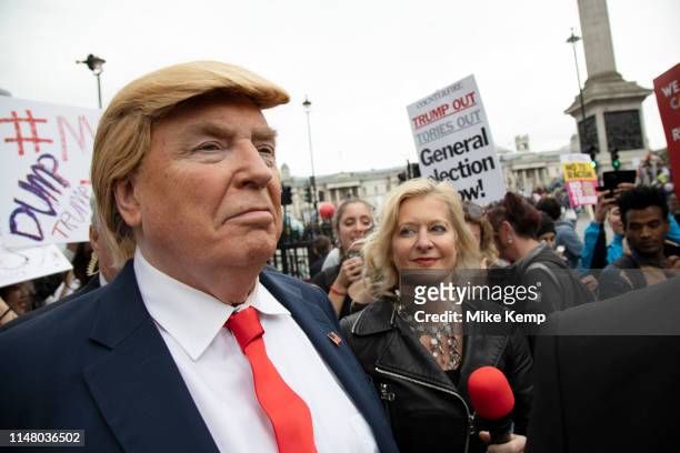 Donald Trump lookalike works the crowds in Trafalgar Square during protests against the state visit of US President Donald Trump on 4th June 2019 in...
