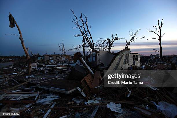 Destroyed homes are seen after a massive tornado passed through the town killing at least 126 people on May 26, 2011 in Joplin, Missouri. The town...