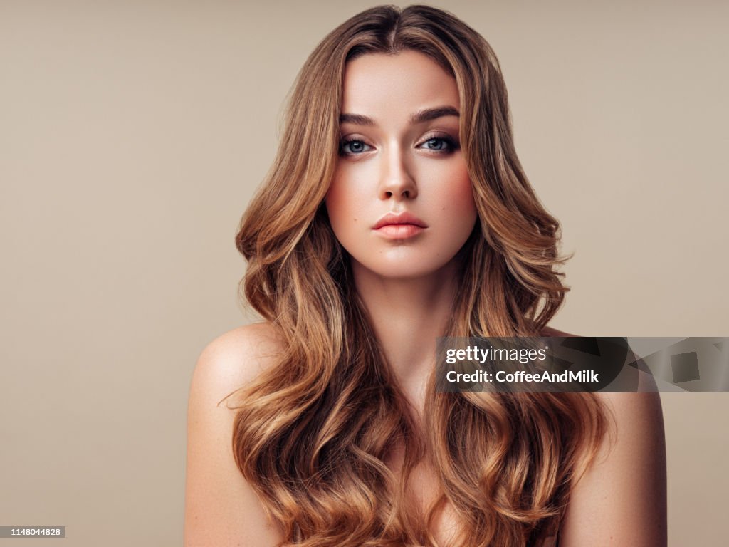 Young Beautiful Woman With Long Hair High-Res Stock Photo - Getty Images