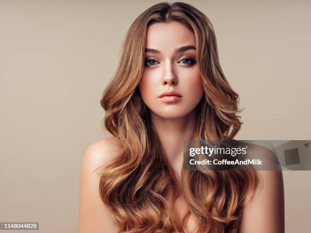 young beautiful woman with long hair - wavy hair imagens e fotografias de stock