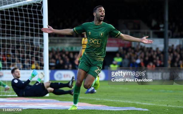Hamilton of Mansfield Town celebrates scoring his sides first goal during the Sky Bet League Two Play-off Semi Final First Leg match between Newport...