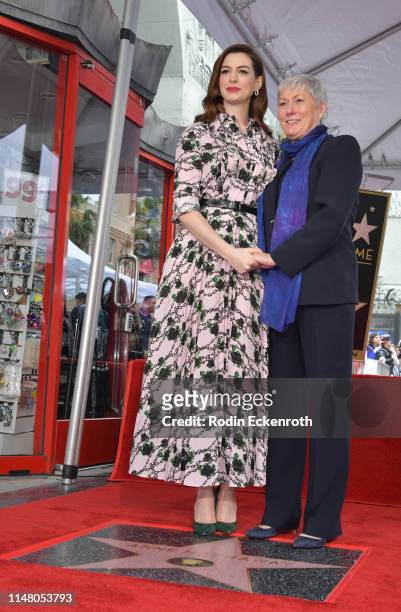 Anne Hathaway and her mother Kate McCauley Hathaway pose for portrait at Anne Hathaway Honored With Star On The Hollywood Walk Of Fame on May 09,...