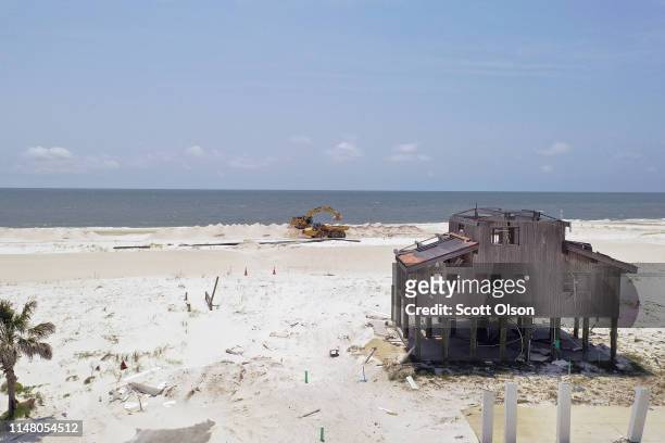 The remains of a home that was destroyed by Hurricane Michael sits along the beach on May 09, 2019 in Mexico Beach, Florida. Seven months after the...