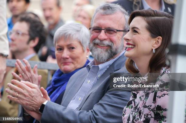 Kate McCauley Hathaway and Richard Hathaway proudly look on as their daughter, actress and producer Anne Hathaway attends is honored with a star on...