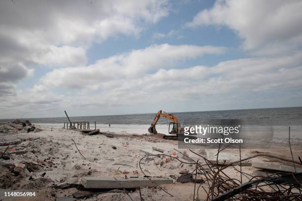 Concrete from broken building foundations destroyed by Hurricane Michael sit along the beach on May 09, 2019 in Mexico Beach, Florida. Seven months...