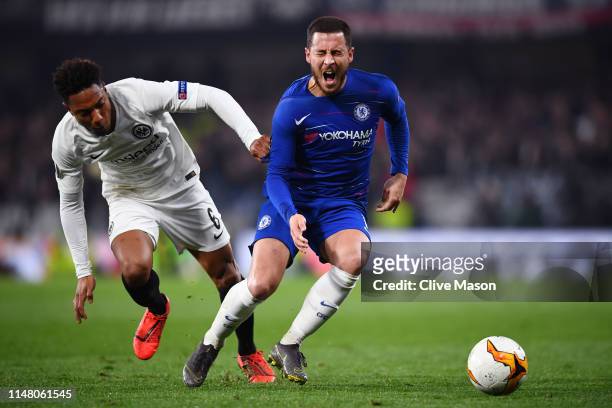 Eden Hazard of Chelsea reacts under pressure from Jonathan De Guzman of Eintracht Frankfurt during the UEFA Europa League Semi Final Second Leg match...