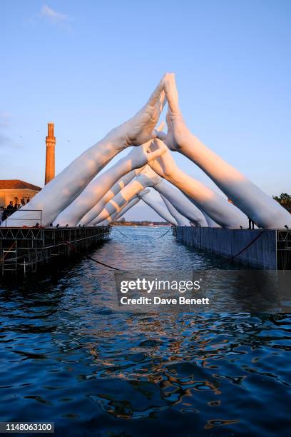 Lorenzo Quinn’s Building Bridges by Halcyon Gallery during Venice Biennale 2019 on May 09, 2019 in Venice, Italy.