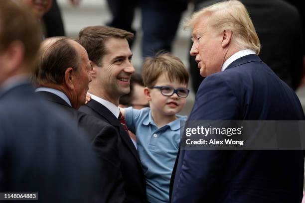 President Donald Trump greets Sen. Tom Cotton during a South Lawn event at the White House May 9, 2019 in Washington, DC. President Donald Trump...