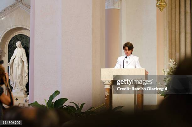 boy talking at altar church - ein junge allein stock-fotos und bilder