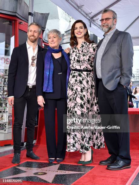 Adam Shulman, Kate McCauley Hathaway, Anne Hathaway, and Gerald Hathaway attend the ceremony honoring Anne Hathaway with star on the Hollywood Walk...