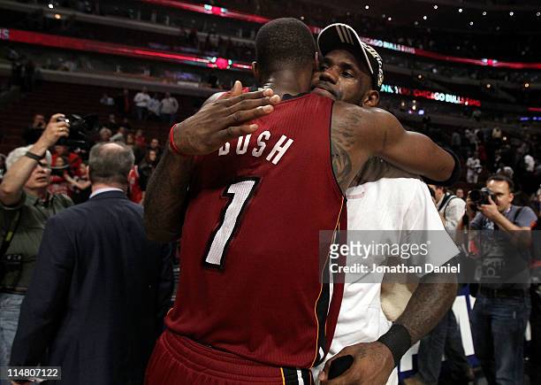 LeBron James and Chris Bosh of the Miami Heat celebrate after they won 83-80 against the Chicago Bulls in Game Five of the Eastern Conference Finals...