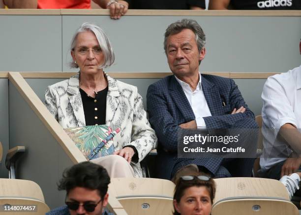 Michel Denisot and his wife Martine Patier attend the victory of Rafael Nadal of Spain during day 10 of the 2019 French Open at Roland Garros stadium...