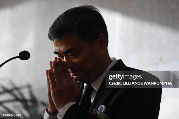 Former Democrat Party leader Abhisit Vejjajiva thanks supporters after quitting the party in protest of their support for Prayut Chan-O-Cha, before...