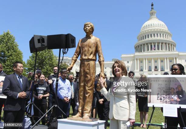 House of Representatives Speaker Nancy Pelosi speaks in front of the newly opened statue of an unidentified Chinese man known as Tank Man, now...