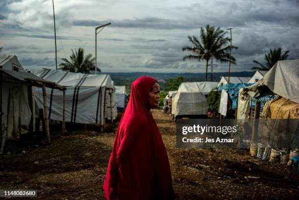 Displaced Marawi resident on the eve of Eidl Fitr inside a tent city for evacuees on June 4, 2019 in Marawi, Philippines. Thousands of displaced and...