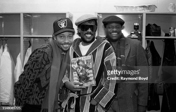 Singers and musicians Robert Wilson, Charlie Wilson and Ronnie Wilson from The Gap Band poses for photos backstage at the U.I.C. Pavilion in Chicago,...