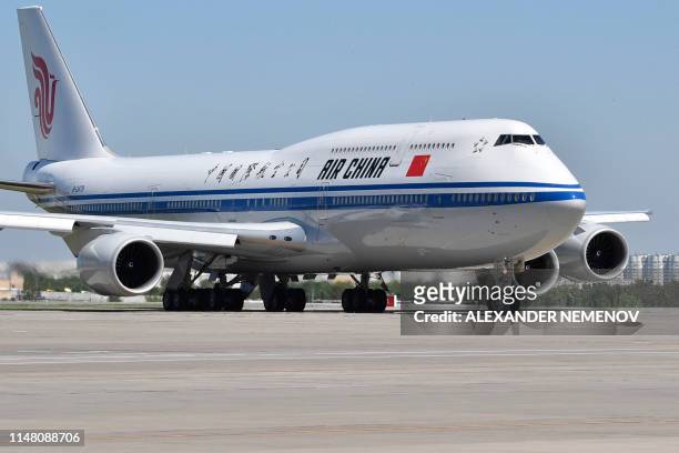 An Air China plane carrying Chinese President Xi Jinping taxis upon arrival at Moscow's Vnukovo airport on June 5, 2019.