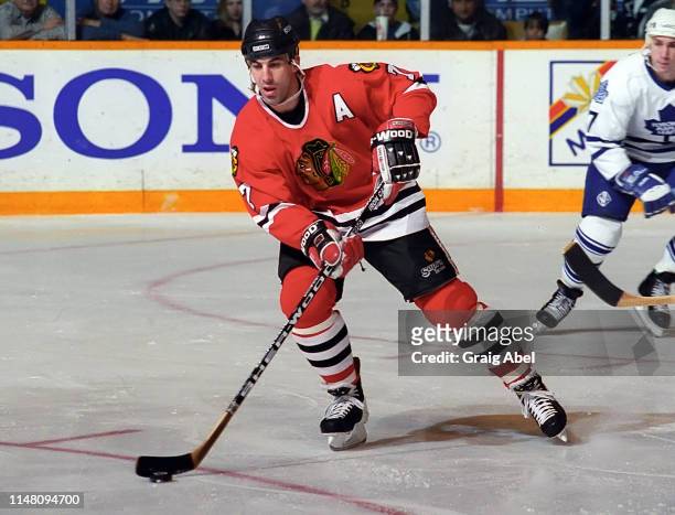 Chris Chelios of the Chicago Black Hawks skates against the Toronto Maple Leafs during NHL game action on March 11, 1995 at Maple Leaf Gardens in...