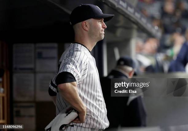 Happ of the New York Yankees reacts in the dugout after he was pulled from the game in the sixth inning against the Seattle Mariners at Yankee...