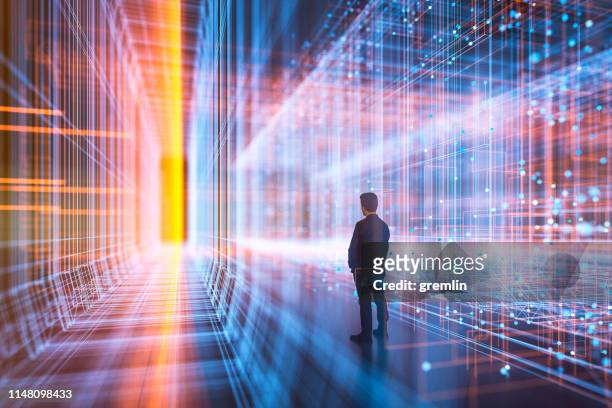 businessman standing in virtual reality display - diminishing perspective road stock pictures, royalty-free photos & images