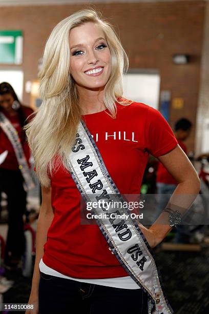 Miss Maryland Allyn Rose builds bikes for children of the troops at Pier 88 on May 26, 2011 in New York City.