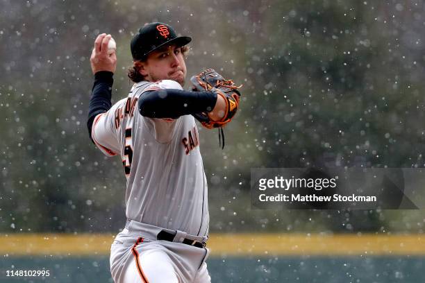 Starting pitcher Derek Holland of the San Francisco Giants throws at in the first inning against the Colorado Rockies at Coors Field on May 08, 2019...