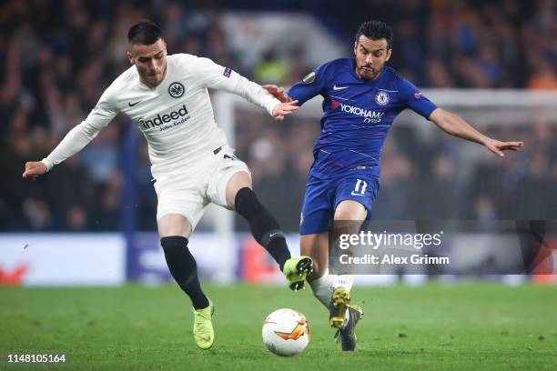 Filip Kostic of Frankfurt is challenged by Pedro of Chelsea during the UEFA Europa League Semi Final Second Leg match between Chelsea and Eintracht...