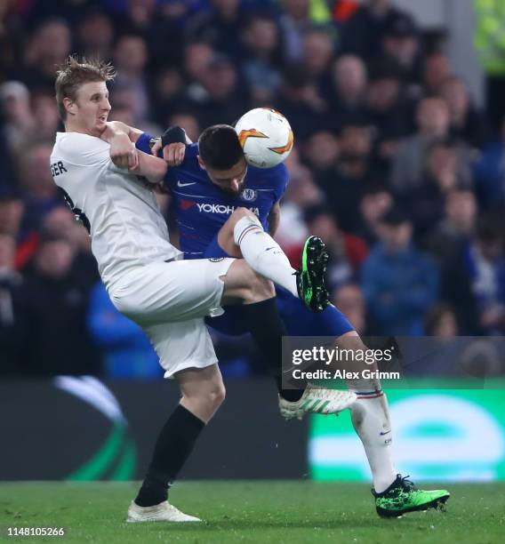 Olivier Giroud of Chelsea is challenged by Martin Hinteregger of Frankfurt during the UEFA Europa League Semi Final Second Leg match between Chelsea...