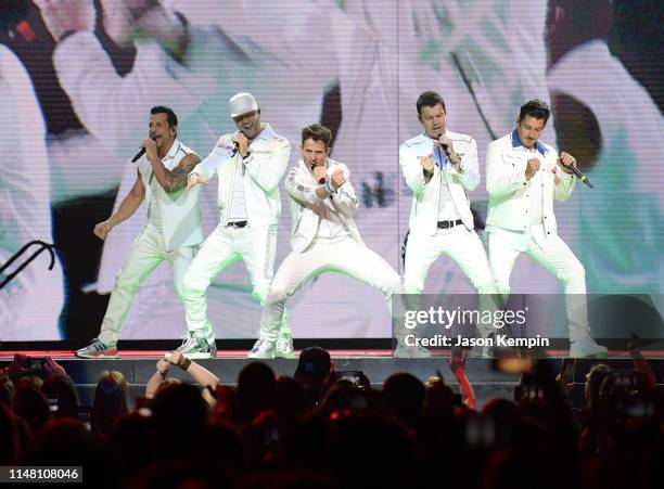 Danny Wood, Donnie Wahlberg, Joey McIntyre, Jordan Knight and Jonathan Knight of the musical group New Kids On The Block perform at Bridgestone Arena...