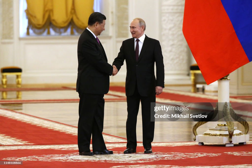Russian President Vladimir Putin receives Chinese President Xi Jinping at the Kremlin