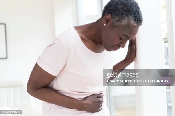 woman with tummy ache - waist up stock pictures, royalty-free photos & images