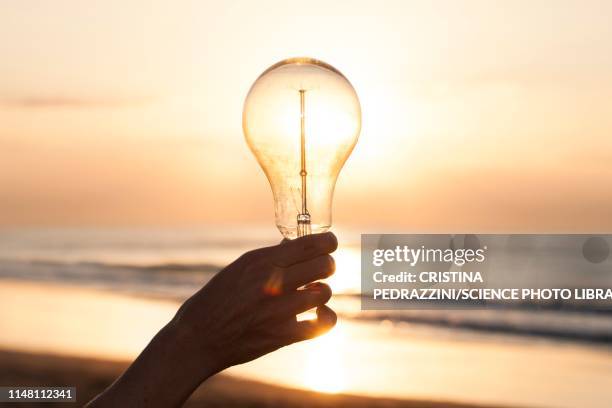 alternative energy, conceptual image - daylight saving time foto e immagini stock