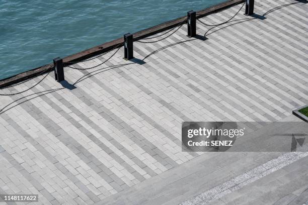 aerial view of the city wharf - pier stock-fotos und bilder