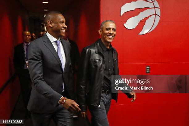 Masai Ujiri of the Toronto Raptors and the 44th President of the United States, Barack Obama walk to the court before Game Two of the NBA Finals...