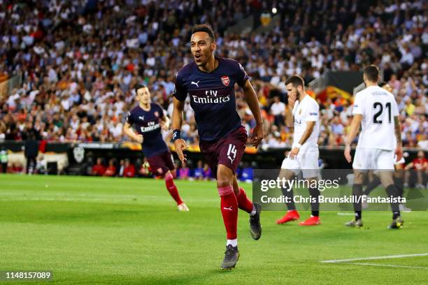 Pierre-Emerick Aubameyang of Arsenal celebrates scoring the equaliser during the UEFA Europa League Semi Final Second Leg match between Valencia and...