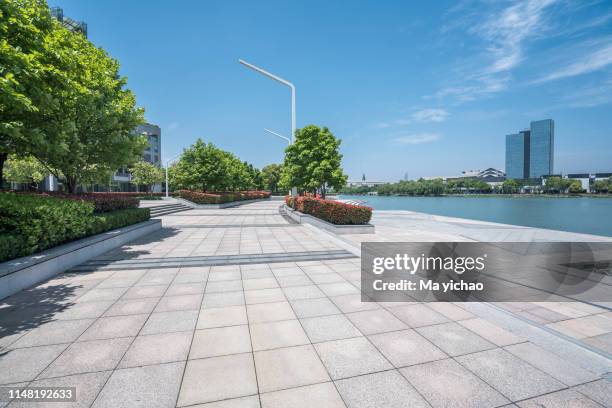 modern building and beautiful city park - garden bench stock pictures, royalty-free photos & images