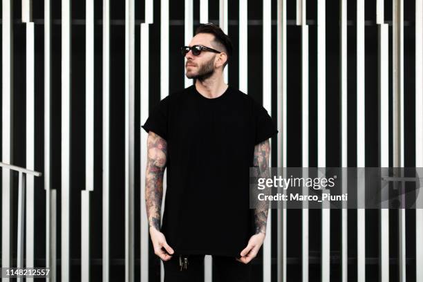 portrait of tattooed young man - blank t shirt model stock pictures, royalty-free photos & images