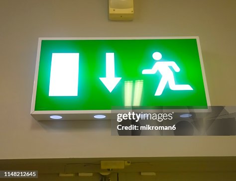 "FIRE EXIT" DOWN ARROW SIGN "FIRE EXIT" DOWN ARROW SIGN