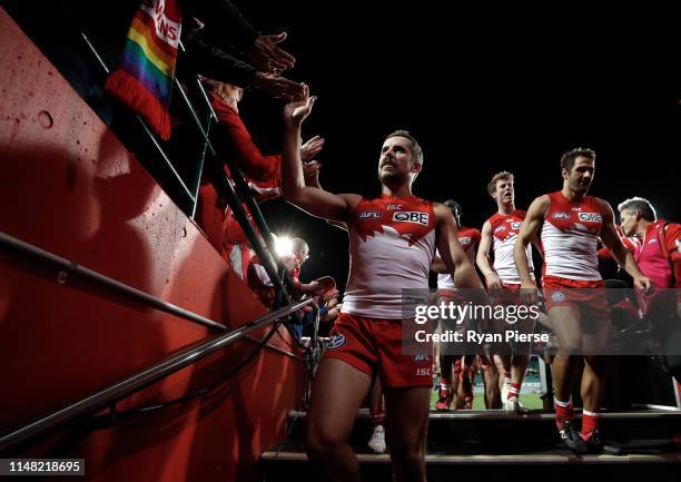 Jake Lloyd of the Swans celebrates after the round eight AFL match between the Sydney Swans and the Essendon Bombers at the Sydney Cricket Ground on...